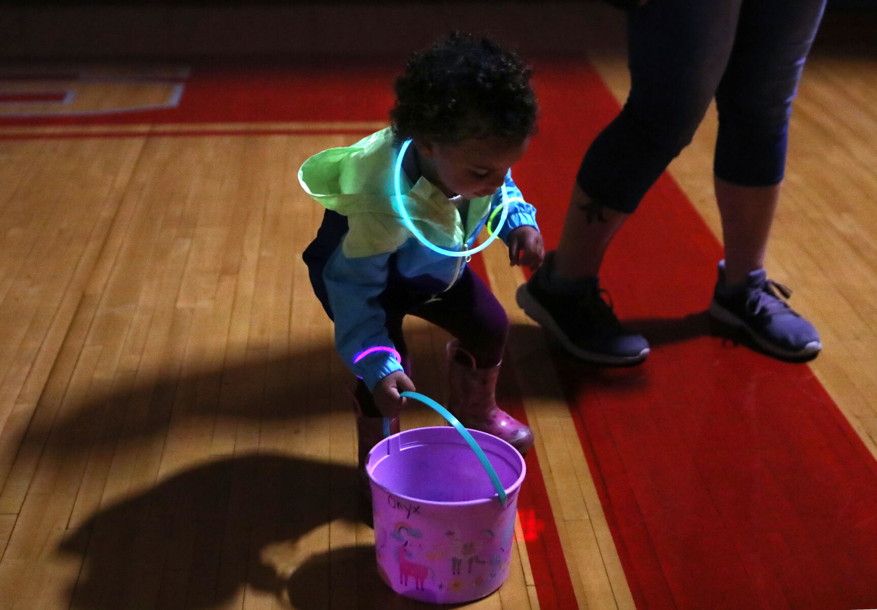 Onyx Campbell scoops up an Easter egg